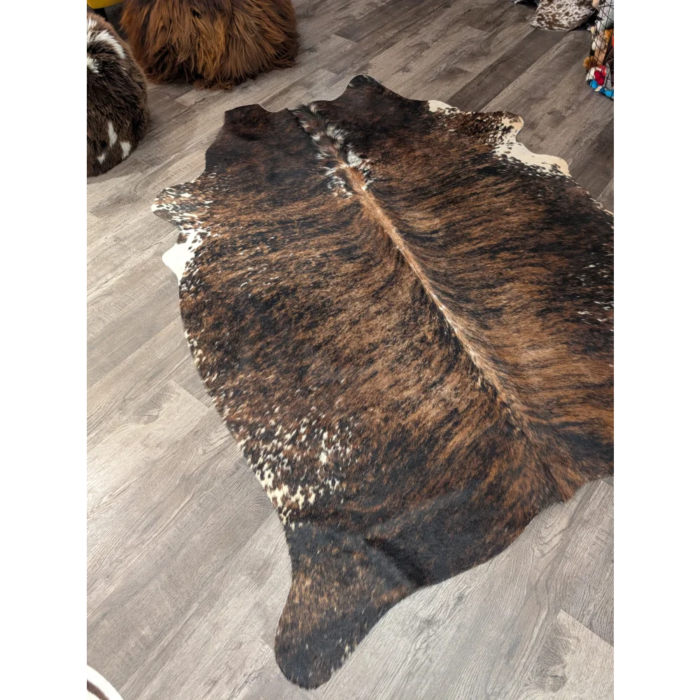 Large cowhide rug t32 78 x 59 with brown and white natural fur texture by angus oliver