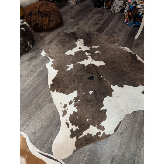 T34 79 x 67 large cowhide rug with natural brown and white patches perfect for angus oliver décor