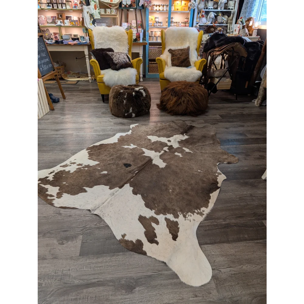 Brown and white large cowhide rug with natural irregular patches in angus oliver t34 79 x 67 gorgeous cowhide