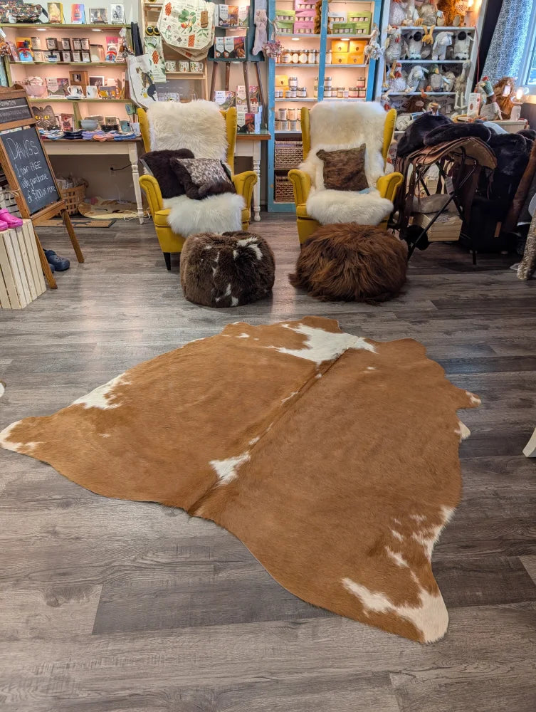 Large cowhide rug t35 68 x 68 inches with brown and white natural irregular edges by angus oliver