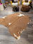 T35 68 x 68 large brown and white cowhide rug with natural fur texture by angus oliver