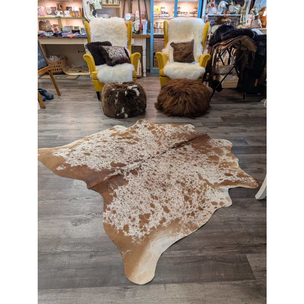 T36 67 x 68 gorgeous large cowhide rug with brown and white speckled angus oliver design