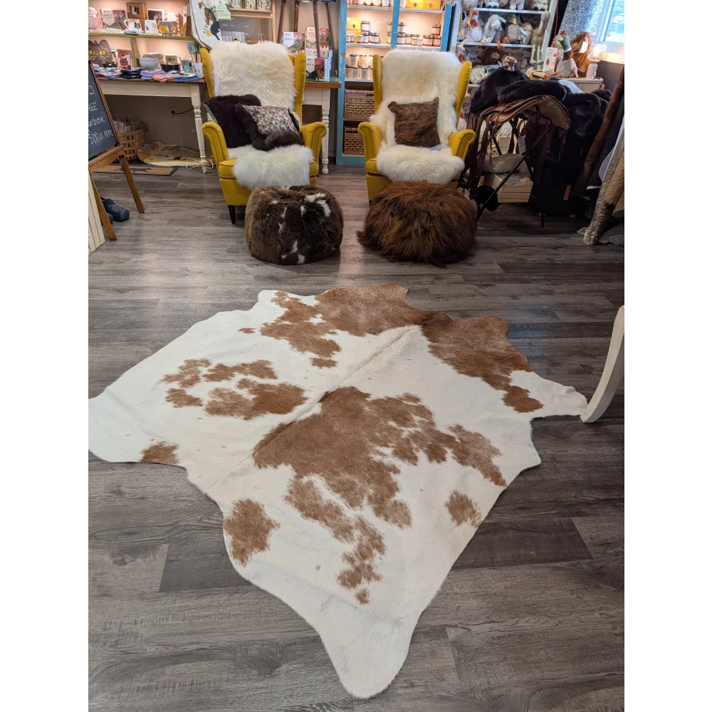 Large angus oliver cowhide rug 74 x 57 with brown and white natural irregular patches perfect for decor