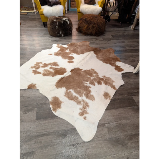 Large cowhide rug t38 74 x 57 with natural brown and white patches by angus oliver