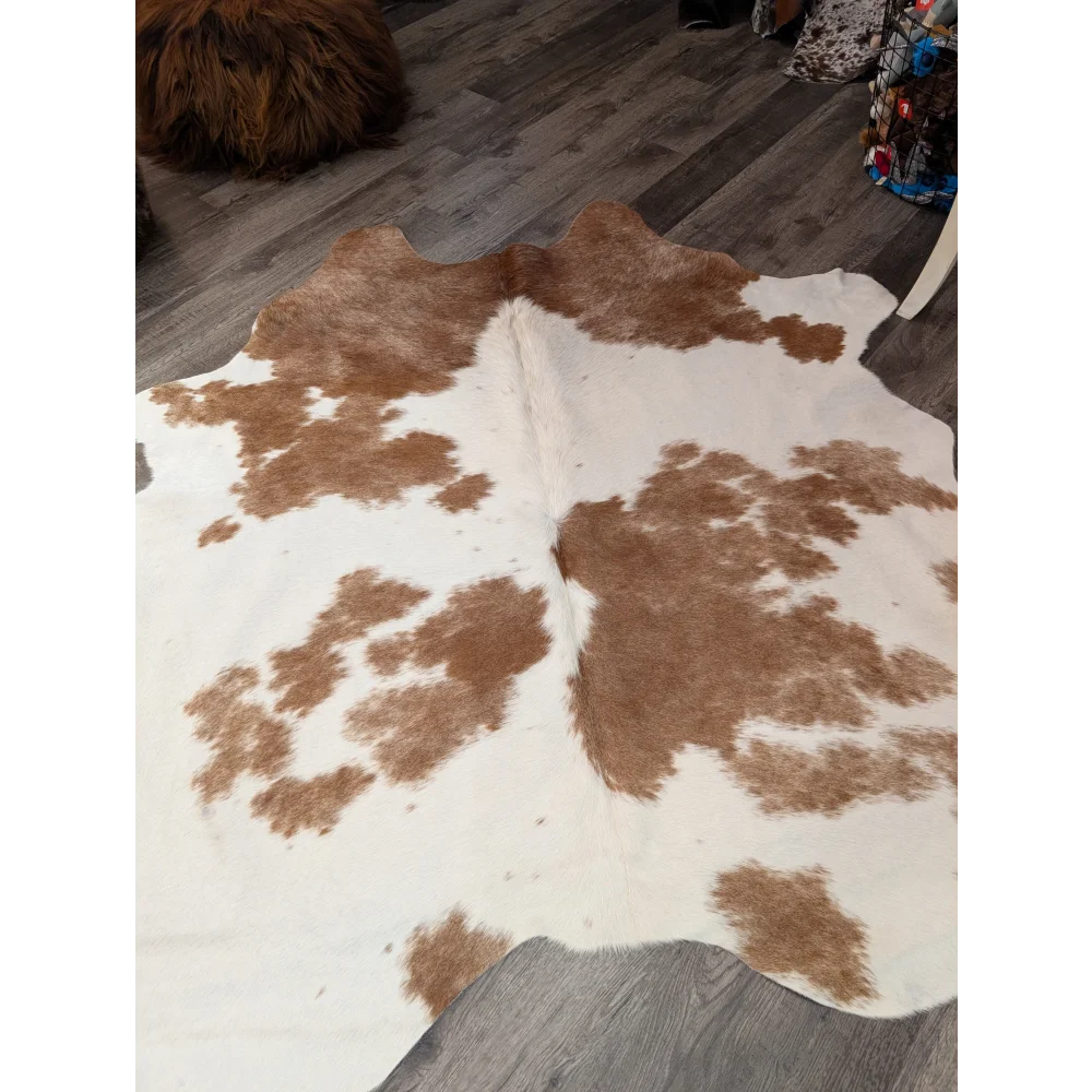 Large cowhide rug t38 74 x 57 with brown and white natural fur texture by angus oliver
