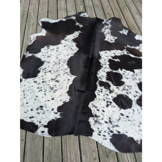 Large cowhide rug t4 with natural black and white fur texture showcasing unique characteristics