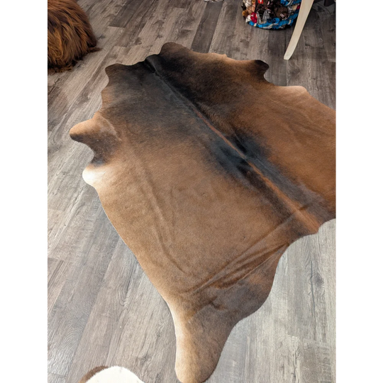 Large cowhide rug t40 with natural brown and black angus oliver cowhide and soft textured surface