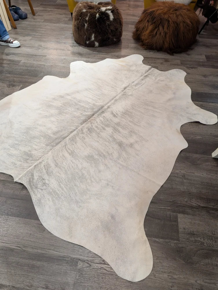 T41 76 x 70 large cowhide rug in natural white with soft texture and subtle grayish undertones by Angus Oliver