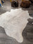 T41 76 x 70 large cowhide rug in natural white with soft texture and subtle grayish undertones by Angus Oliver