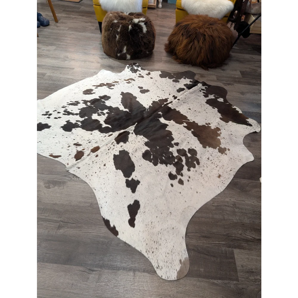 T42 gorgeous large cowhide rug in natural white and brown with speckled pattern by angus oliver
