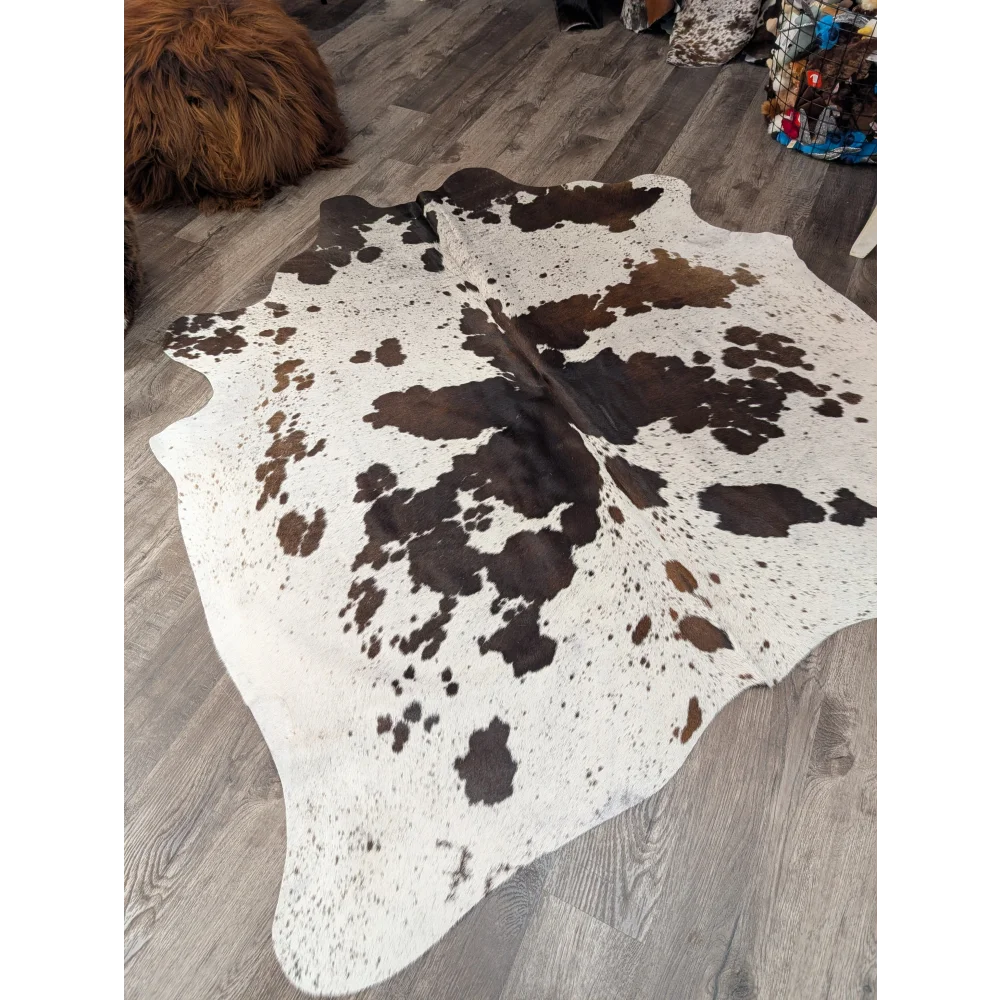 T42 69 x 66 large cowhide rug with white brown natural patches and black spots by angus oliver