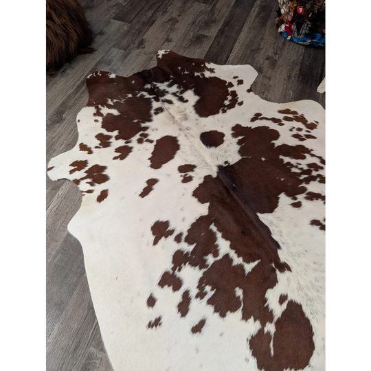T43 80 x 69 large cowhide rug with natural brown and white patches by angus oliver perfect for home decor