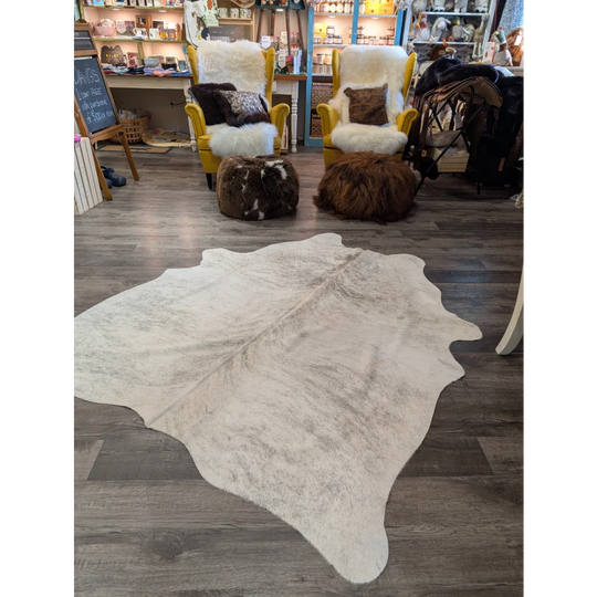 T44 74 x 65 large cowhide rug by angus oliver with natural cream and beige tones and soft textured surface