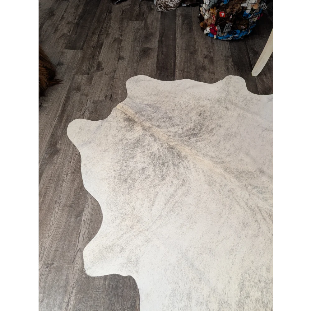 Large cowhide rug t44 74 x 65 white with natural edges and subtle grayish brown markings by angus oliver