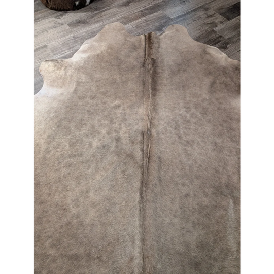 T45 77 x 64 gorgeous cowhide large cowhide rug in natural tan with soft texture and central seam by angus oliver