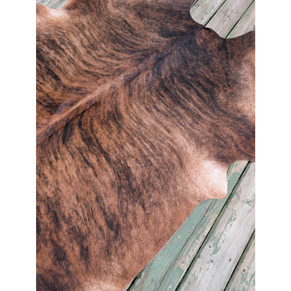 T8 76 x 76 large cowhide rug with brown and black stripes and unique natural fur texture