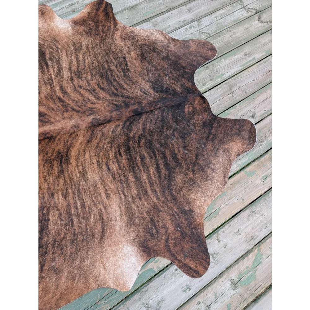 T8 76 x 76 large cowhide rug with brown and black stripes and unique natural irregular edges