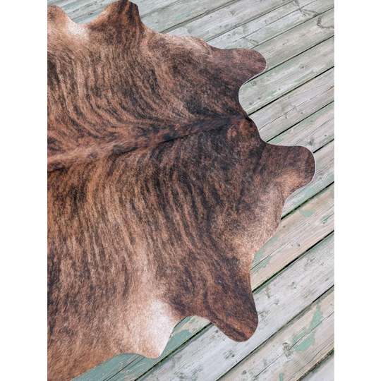 T8 76 x 76 large cowhide rug with brown and black stripes and unique natural irregular edges