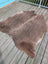 Large cowhide rug t9 with natural brown color soft texture and unique characteristics perfect for any space