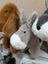 Gray plush donkey with white muzzle and black button eyes named the donkey perfect for cuddling or gifting