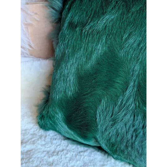 Emerald green faux fur throw blanket with a plush textured surface perfect for dyed green decor by angus oliver