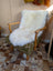 Gorgeous Merino sheepskin throw on vintage green armchair