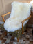 Gorgeous Merino sheepskin throw on green armchair, OEKO TEX certified
