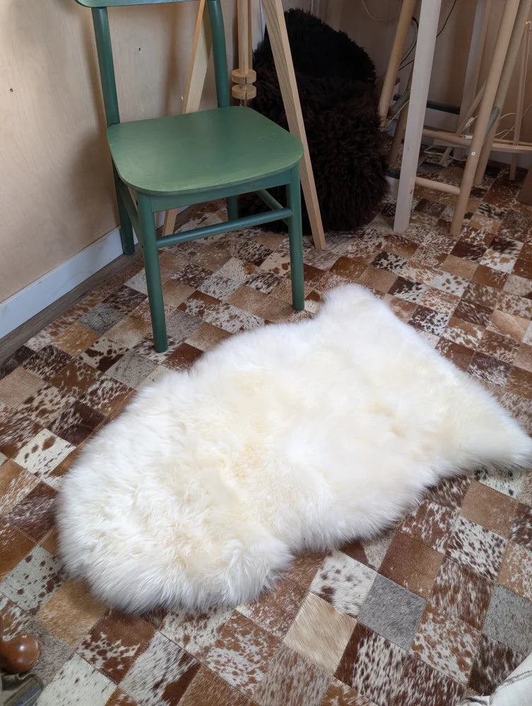 Gorgeous VERY SOFT Merino sheepskin rug on checkered floor