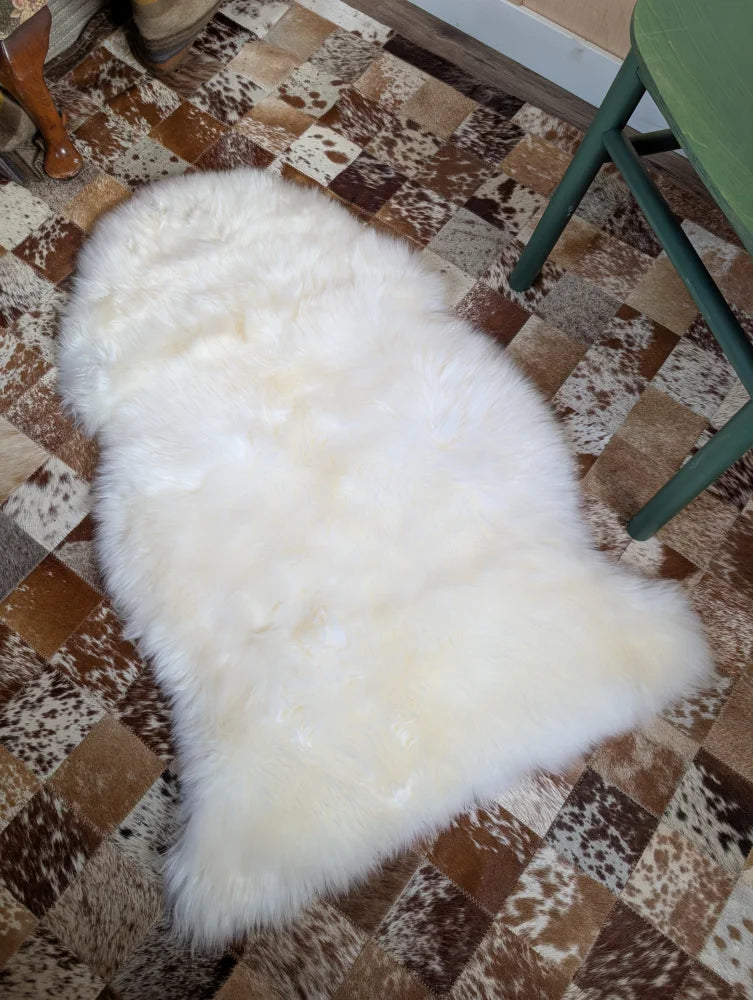 Gorgeous Merino sheepskin rug on cowhide floor, OEKO TEX certified