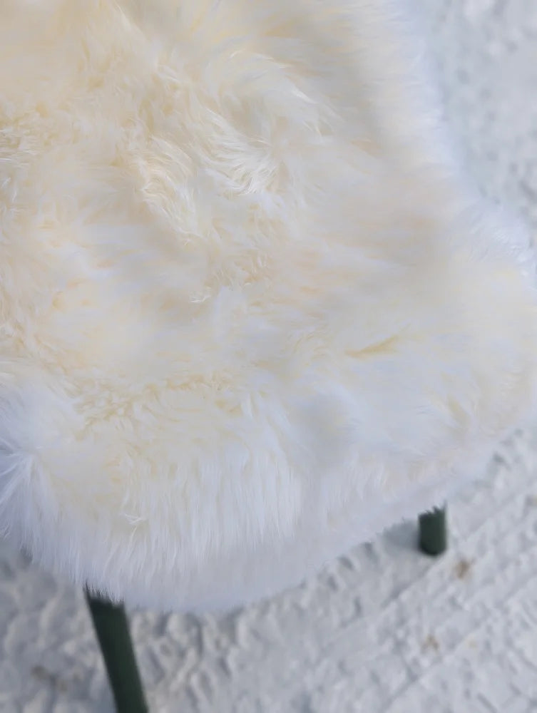 Gorgeous Merino sheepskin plush white faux fur chair with dark green legs