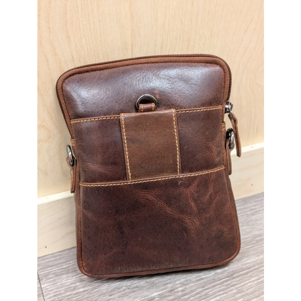 Timber mini crossbody leather bag in brown with stitching and metal hardware