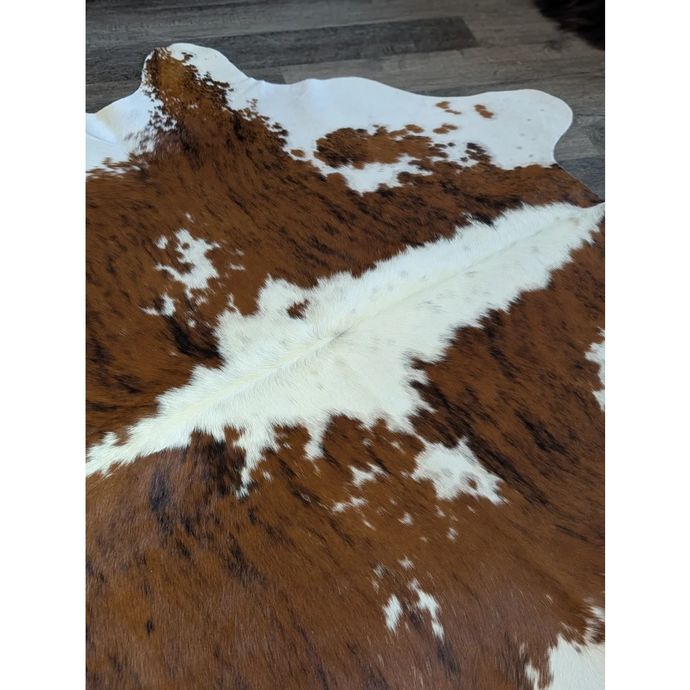Extra large brown and white cowhide rug tri600 with beautiful natural fur texture perfect for stylish home decor