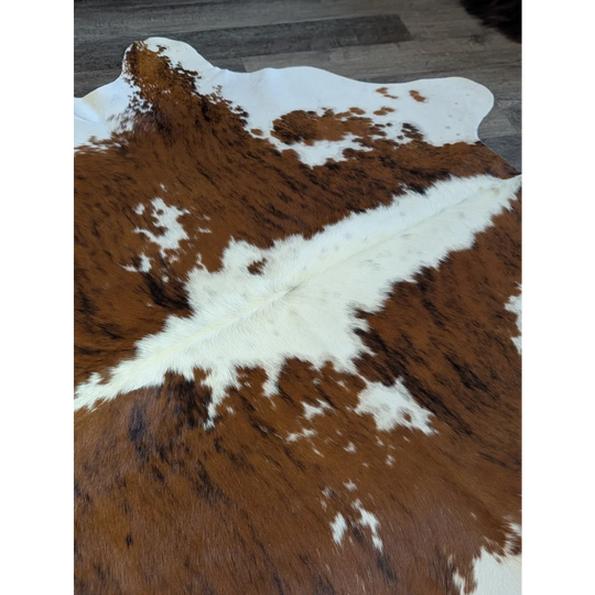 Extra large brown and white cowhide rug tri600 with beautiful natural fur texture perfect for stylish home decor