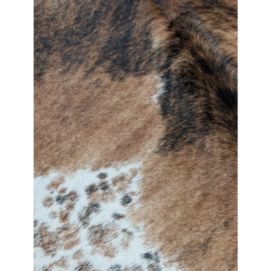 Extra large cowhide rug in brown black and white patches perfect for beautiful rugs and large cowhide decor