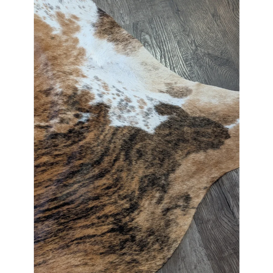 Extra large cowhide rug tri603 brown and white with natural irregular patterns perfect for beautiful rugs and large cowhide decor