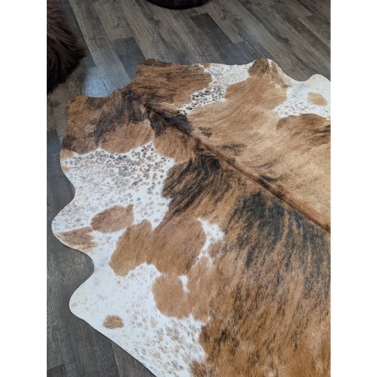 Brown and white extra large cowhide rug tri603 with natural fur texture perfect for beautiful rugs and large cowhide decor