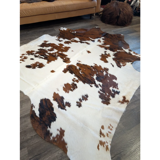 Tri604 extra large cowhide rug with white base and irregular brown patches soft textured surface beautiful rugs
