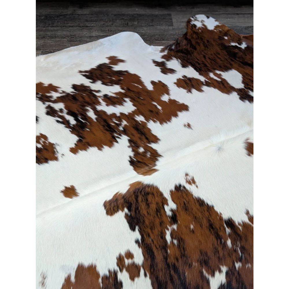 Extra large cowhide rug tri604 with brown and white natural patches perfect for beautiful rugs and large cowhide decor