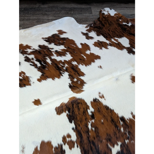 Extra large cowhide rug tri604 with brown and white natural patches perfect for beautiful rugs and large cowhide decor