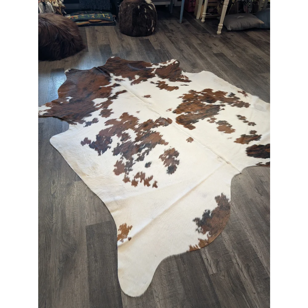 Extra large cowhide rug tri604 with brown and white natural patches perfect for beautiful rugs and large cowhide decor