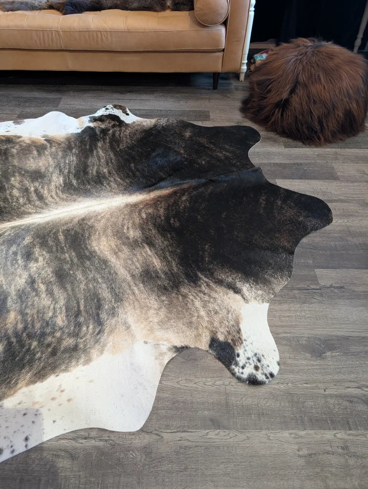 Tri605 extra large cowhide rug with striking black white and brownish gray marbling perfect for beautiful rugs and large cowhide use