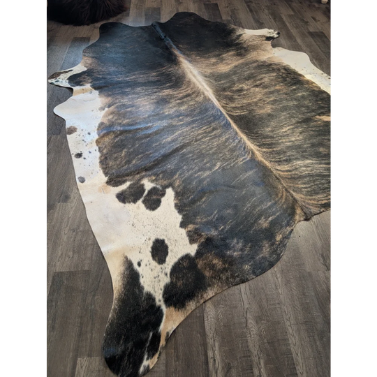 Extra large cowhide rug tri605 heart 99 x 84 natural black and white spotted large cowhide on wooden floor