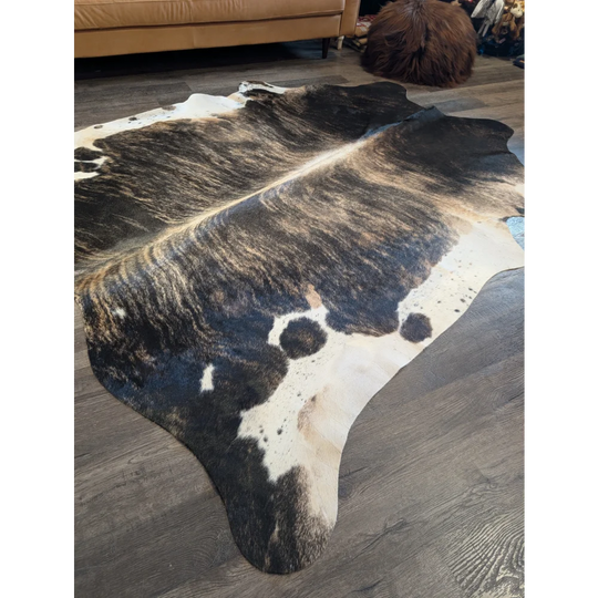 Tri605 extra large cowhide rug in natural black and white with textured irregular pattern perfect for beautiful rugs