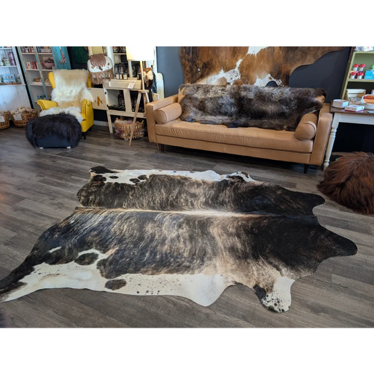 Extra large cowhide rug tri605 in natural black and white with textured unprocessed surface perfect for beautiful rugs