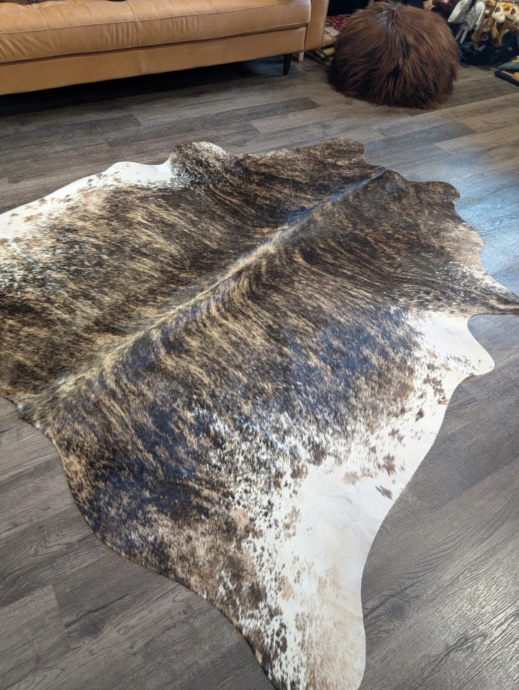 Extra large cowhide rug tri607 in brown and white with natural irregular patterns perfect for beautiful rugs lovers