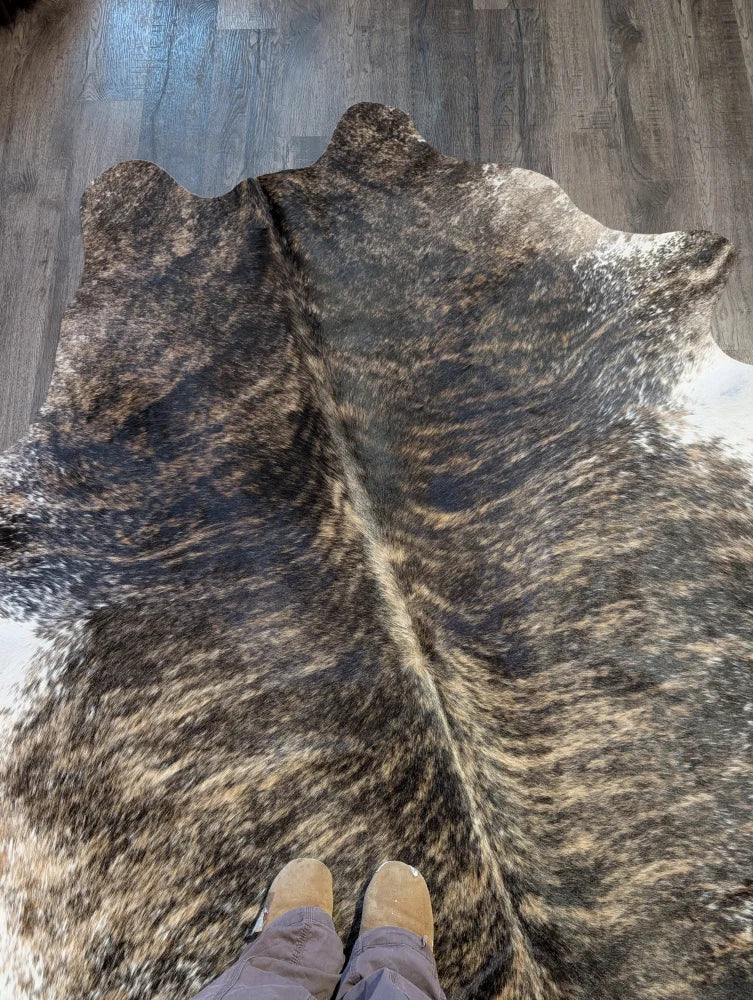 Extra large cowhide rug tri607 in brown and white with natural irregular edges perfect for beautiful rugs lovers