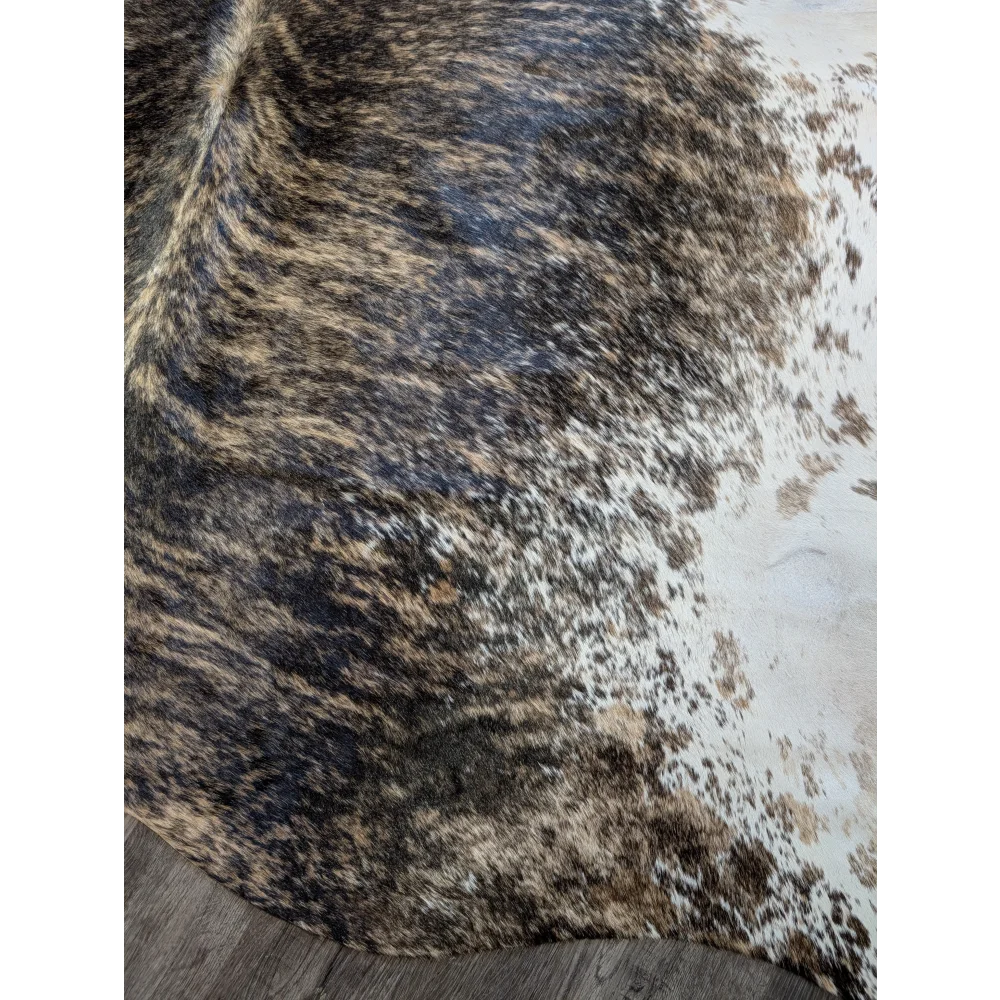 Extra large cowhide rug tri607 with a beautiful mottled black brown and white pattern perfect for large cowhide lovers