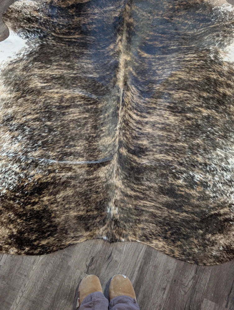 Extra large cowhide rug tri607 with a beautiful mottled pattern in dark brown black and tan perfect for large cowhide lovers
