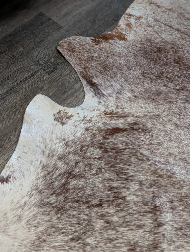 Extra large brown and white cowhide rug tri611 heart 87 x 79 with a natural textured surface perfect for beautiful rugs and large cowhide decor