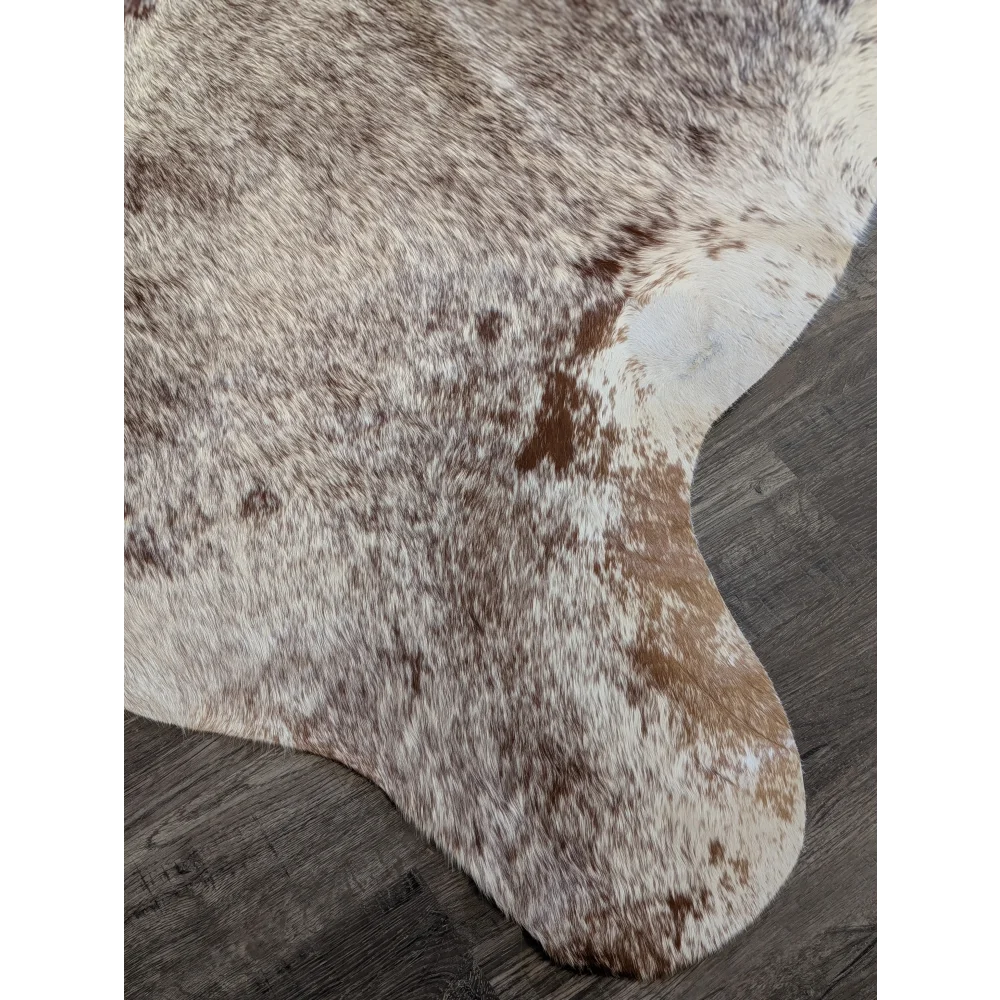 Extra large cowhide rug with white and brown mottled fur perfect for beautiful rugs and large cowhide decor